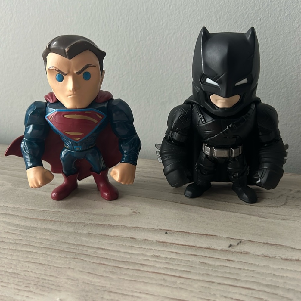 Superman and Batman action figures. Fun for kids or collector items.
